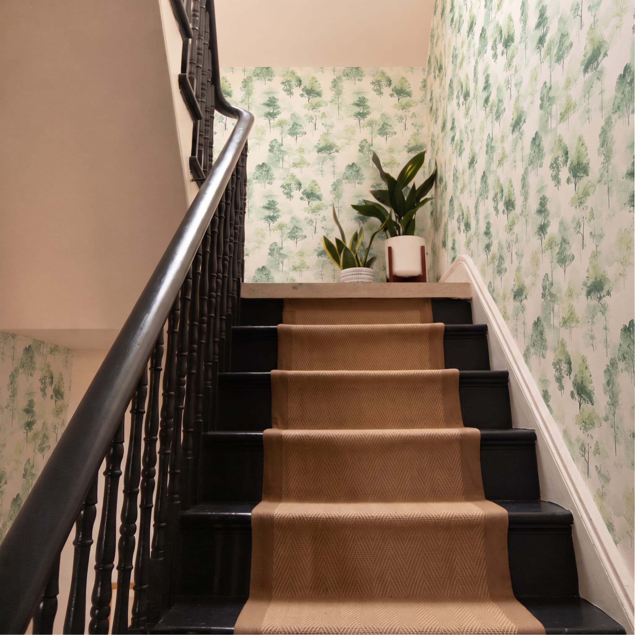 A family home interior where every room is finished in its own wallpaper design